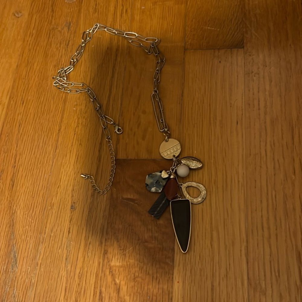 Gold Long statement necklace.